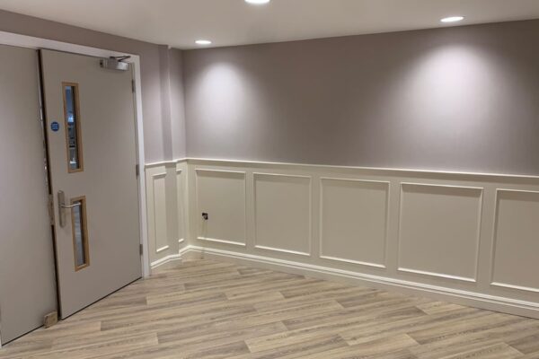 Manufacture and installation of bespoke hand painted wall panelling, trophy cabinets and AV cabinet for BVUK