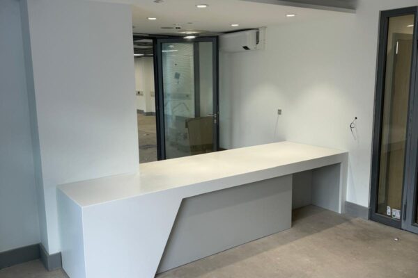 Bespoke fully fitted Corian reception desk for Telford Fire Station