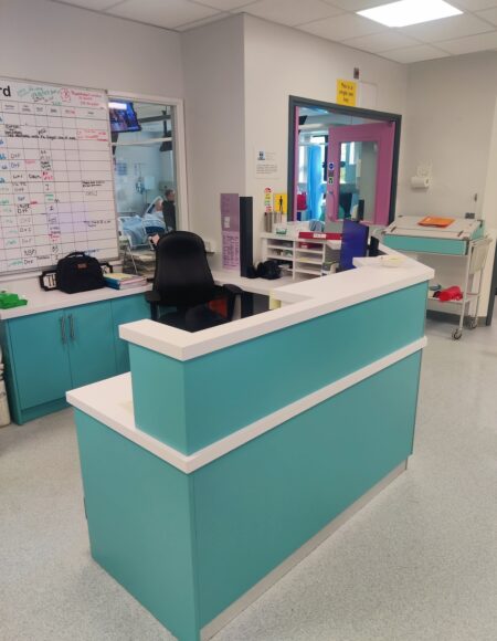 Crafting Efficiency: JFW Ltd Cabinetmakers' Bespoke Nurse Base Counter for Nason Ward