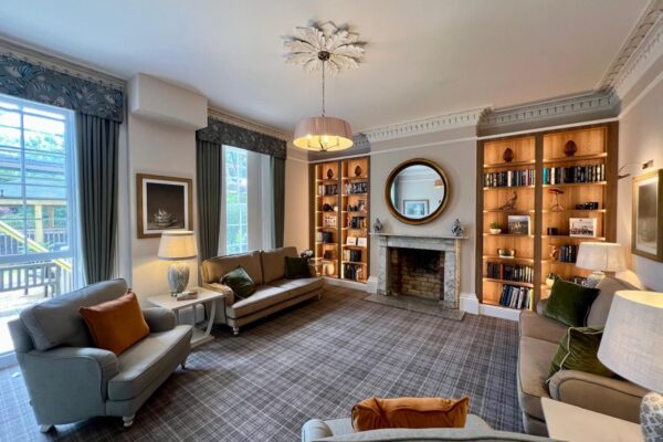 Elegant Bespoke Cabinetry for Queen Charlotte Nursing Home - Library & Lounge Bookcase Installation