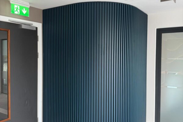 Bespoke Office Reception with Custom Built Reception Desk & Feature Walls for Safran Landing Systems