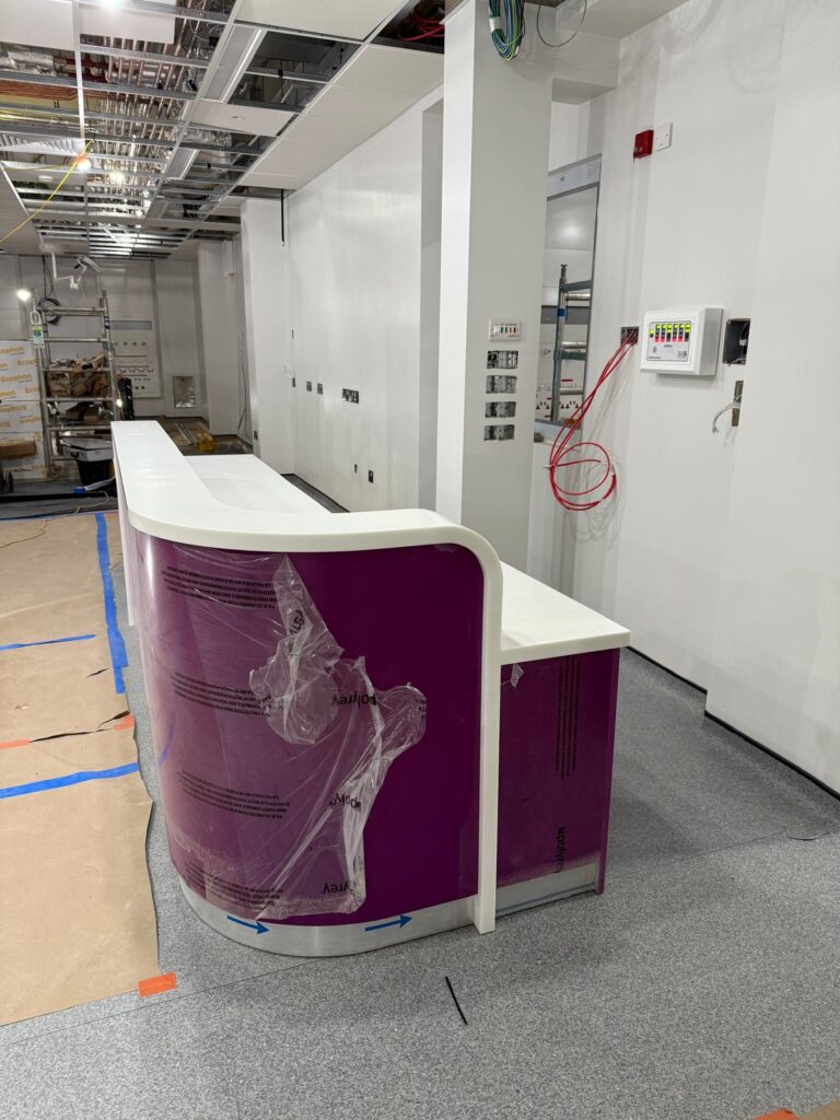 Healthcare Bespoke Joinery Solutions: Nurse Base Desk for George Eliot Hospital by JFW Ltd Cabinetmakers