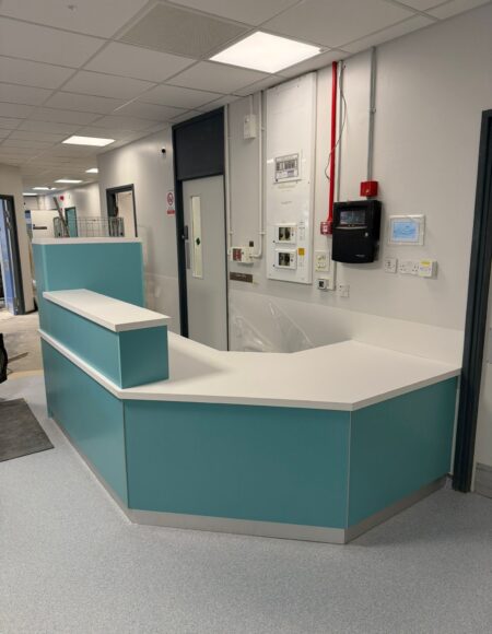 Healthcare Furniture Solutions: Bespoke Nurse Base Desk for Elizabeth Ward, George Eliot Hospital