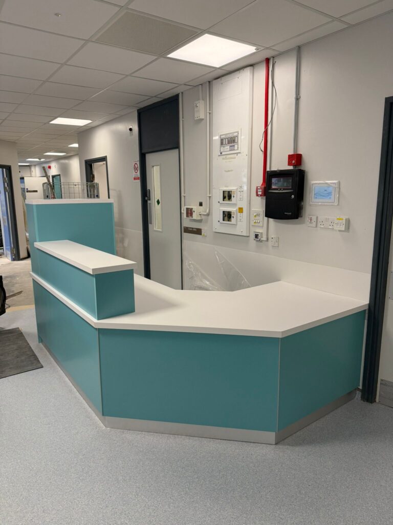 Healthcare Furniture Solutions: Bespoke Nurse Base Desk for Elizabeth Ward, George Eliot Hospital