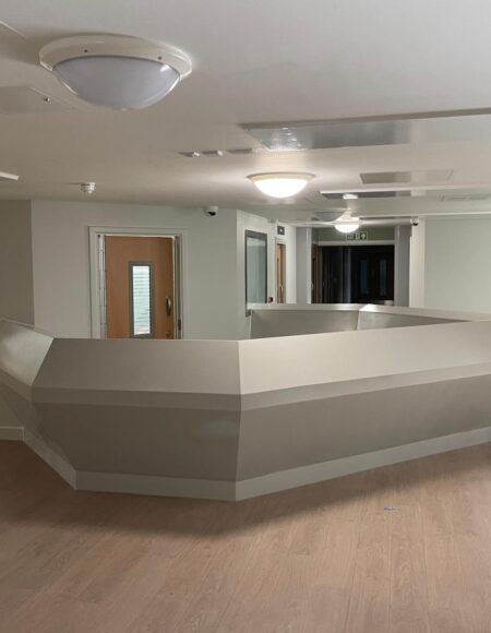 Improving Hospital Ward Functionality – Bespoke Corian Reception Desk